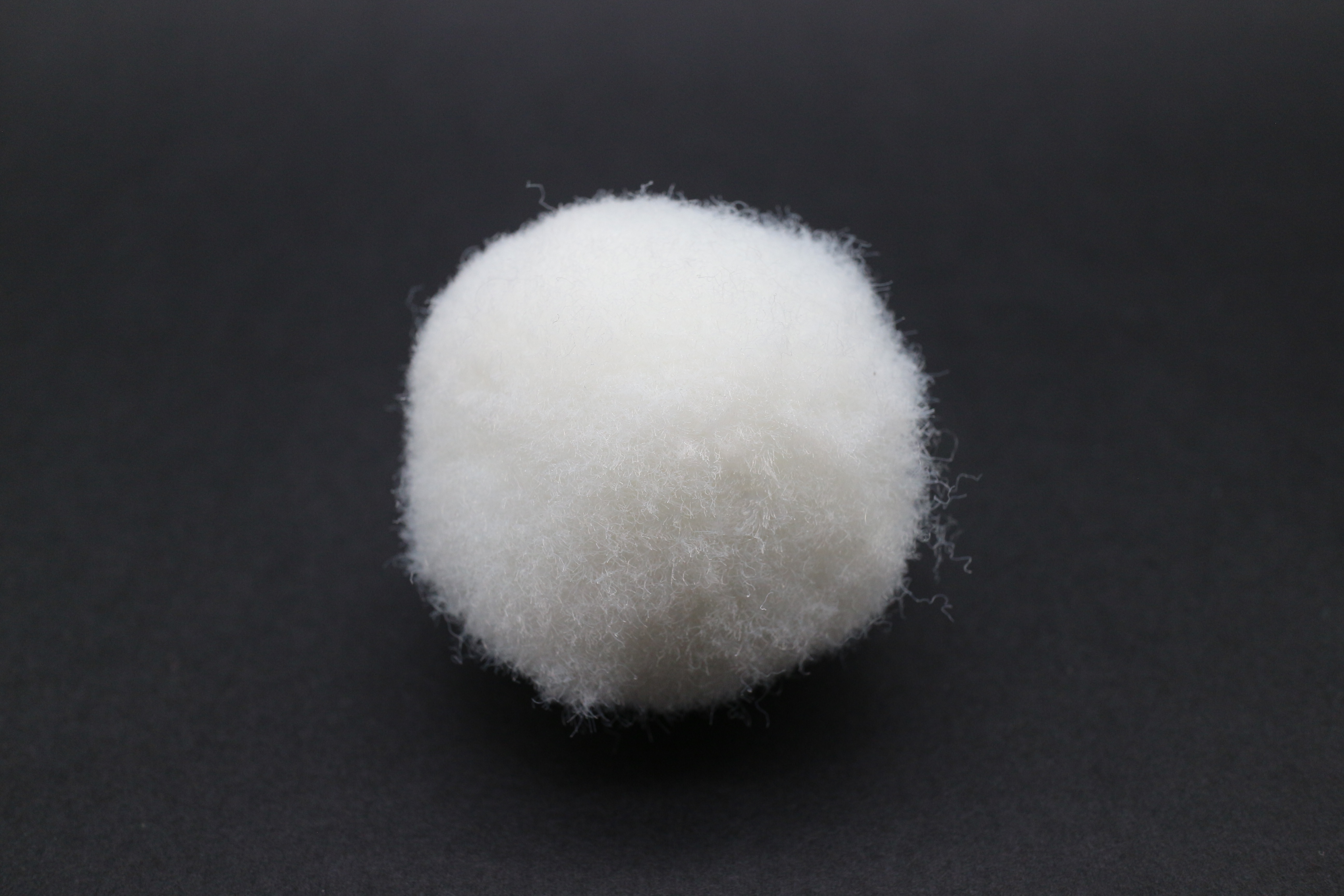 Fiber ball filter material